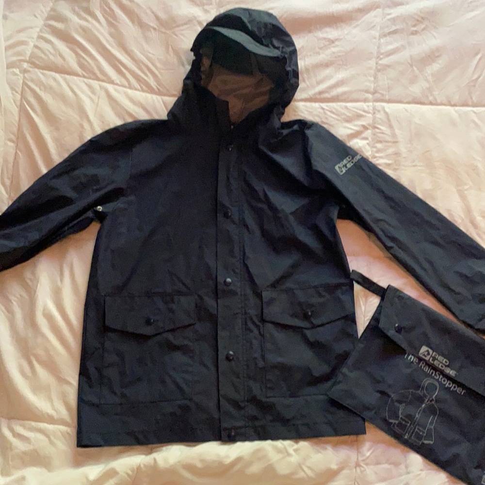 RED LEDGE YOUTH Rain jacket with pouch. Navy BLUE. Size SMALL (7/8).